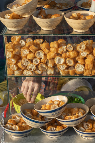 Photography Many fried bread dough - youtiao at at breakfast stall