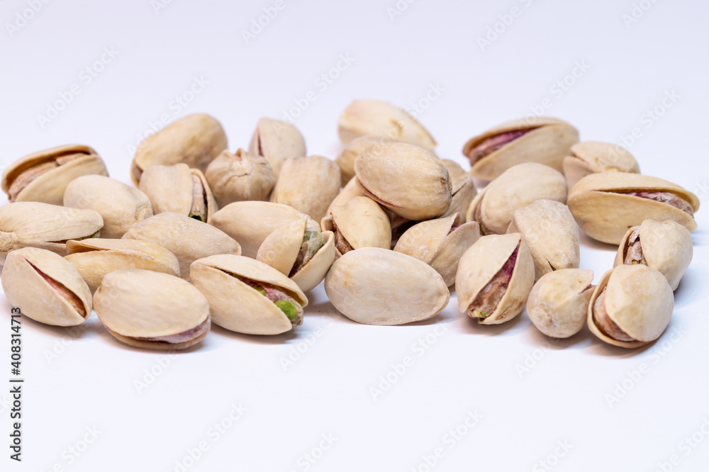Pistachios nutshell isolated on white background.