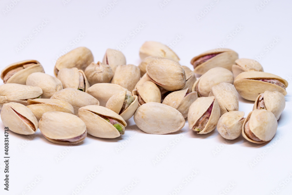 Pistachios nutshell isolated on white background. Pistachios nutshell isolated on white background.