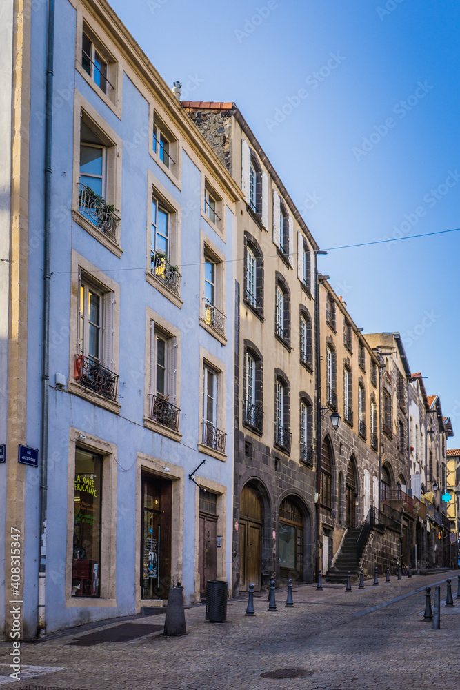 facades of the streets of the medieval neighborhood Montferrand in the city of Clermont Ferrand, Auvergne (France)