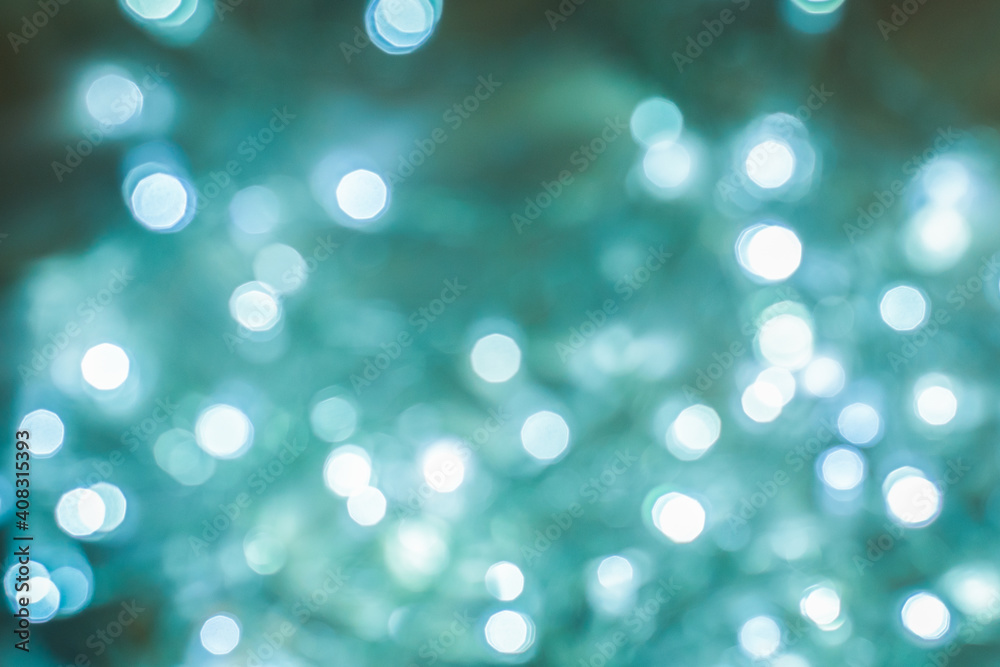 abstract Green tide background. light aquamarine blurry lights. bokeh. texture. concept for christmas, new year, holiday