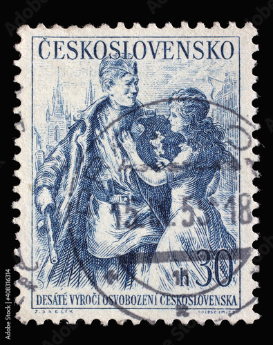 Stamp printed in Czechoslovakia shows Woman Decorating Soviet Soldier, Liberation of Czechoslovakia, 10th Anniversary, circa 1961