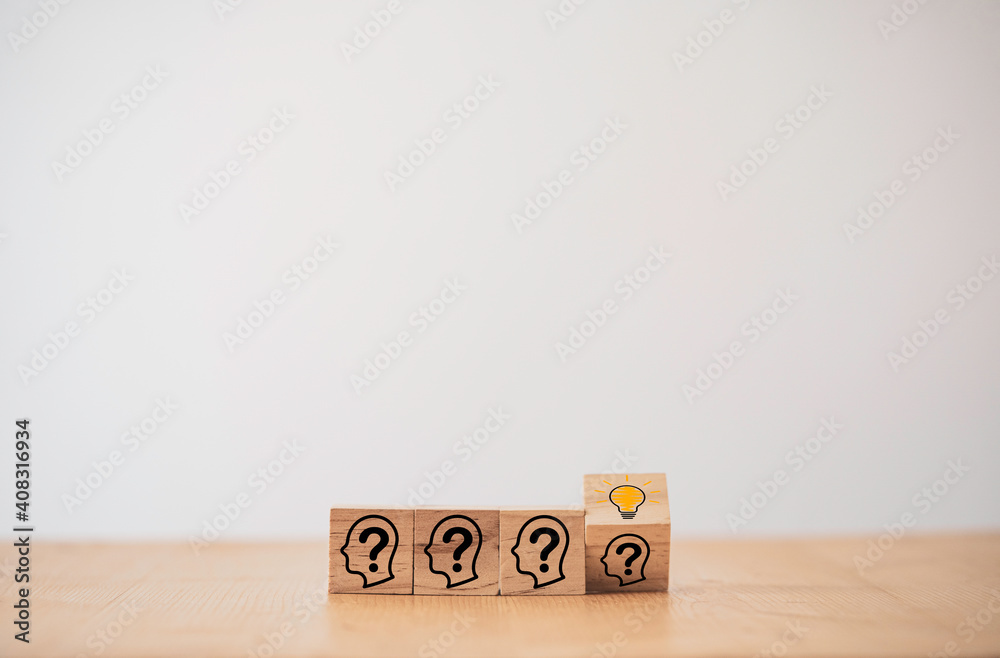 Wooden block cube flipping change from human question to smart thinking and solution problem. It is creative thinking idea and innovation concept. Wooden block cube flipping change from human question to smart thinking and solution problem. It is creative thinking idea and innovation concept.