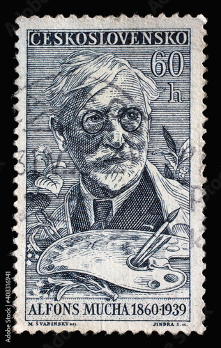 Stamp printed in Czechoslovakia shows a portrait of Alfons Maria Mucha (1860-1939), painter, Stamp Day series, circa 1960 photo