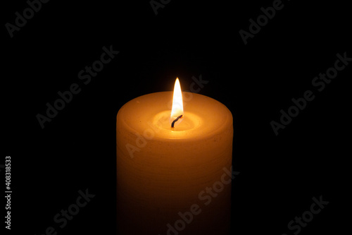 glowing lit candle