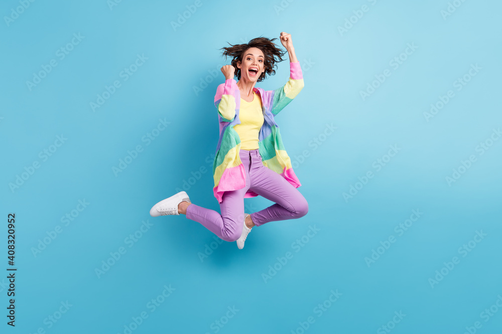 Photo portrait full body view of screaming girl jumping up isolated on pastel blue colored background