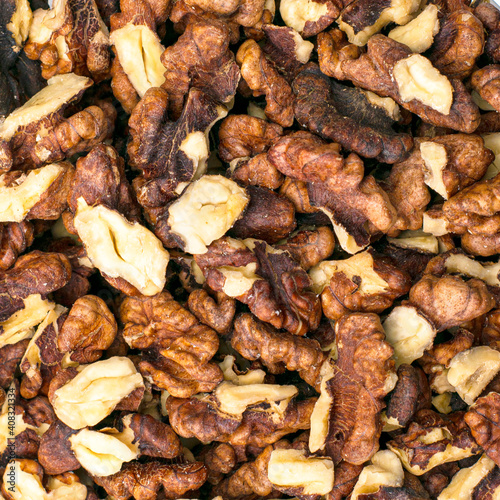 split walnut kernels for background. High quality photo © сергей тарануха