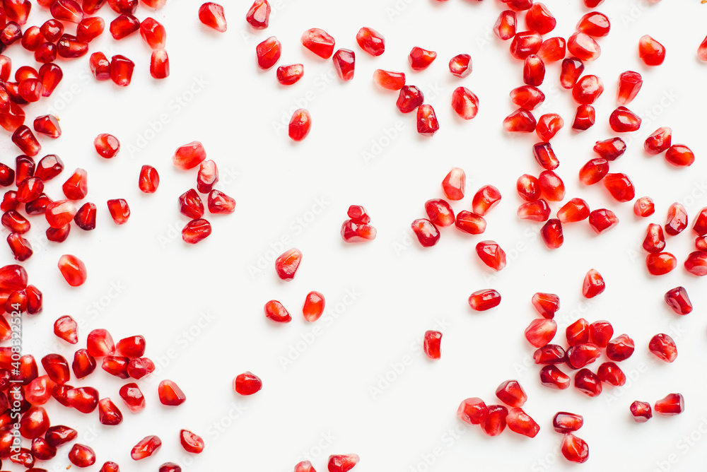 pomegranate seeds on white background, color background pomegranate seeds on white background, color background
