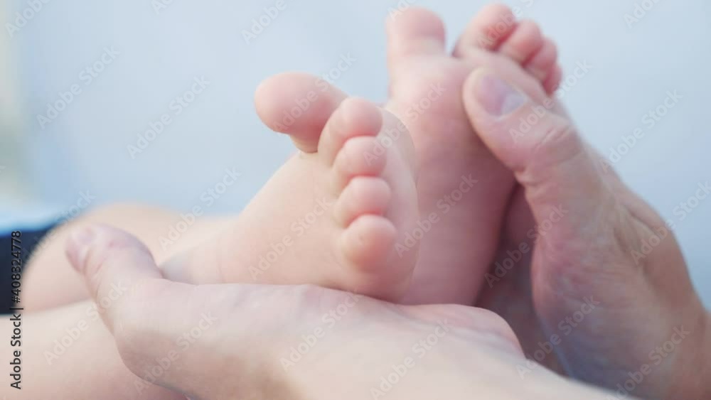 legs feet love baby face model a portrait. concept kid dream happy family massage care. close up legs feet little boy baby. mom holds baby in her arms dream legs feet love baby face model a portrait. concept kid dream happy family massage care. close up legs feet little boy baby. mom holds baby in her arms dream