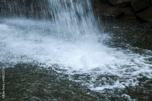 Base of a waterfall photo