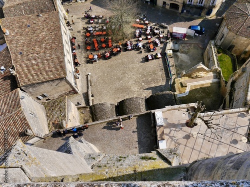 view from the top of the castle to street cafe in Saint Emilion, Monolithic Church of Saint-Emilion