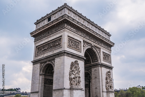 Architectural fragment of Arc de Triomphe. Arc de Triomphe de l'Etoile on Charles de Gaulle Place is one of the most famous monuments in Paris. France. © dbrnjhrj