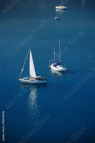 Sailing yachts in the blue waters of the  Saronic Gulf © Pavel