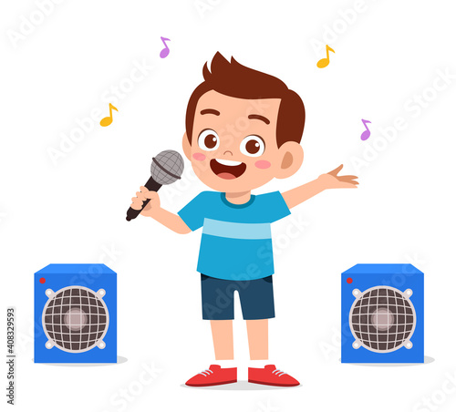 little boy sing a beautiful song on stage