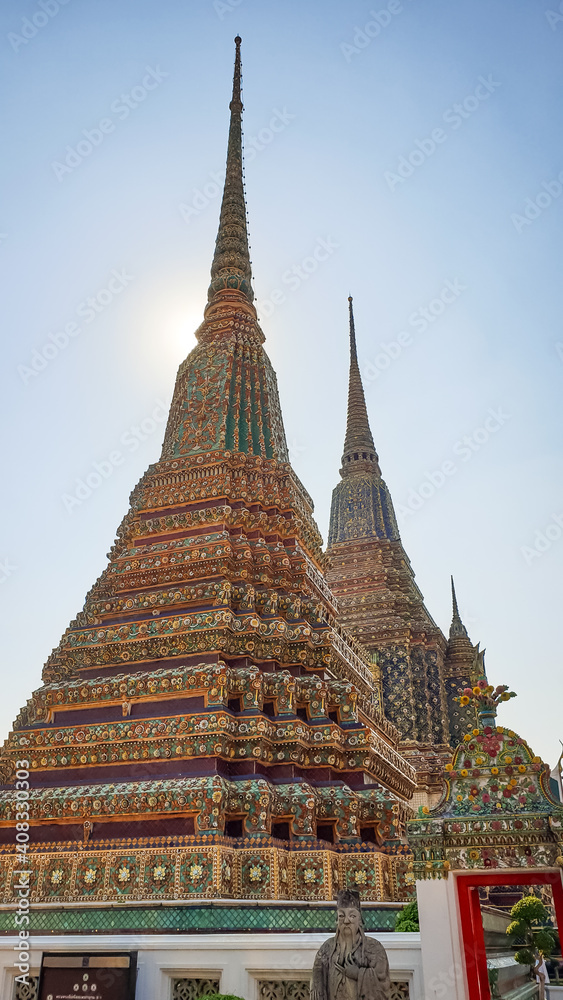 Beautiful Pagoda or Chedi decorated with old ceramic in the temple in Thailand. Wat Phra Chettuphon( Wat Pho)