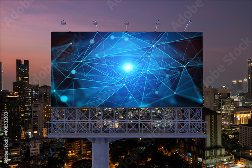 Information flow hologram on road billboard, night panorama city view of Bangkok. The largest technological center in Southeast Asia. The concept of programming science. © VideoFlow