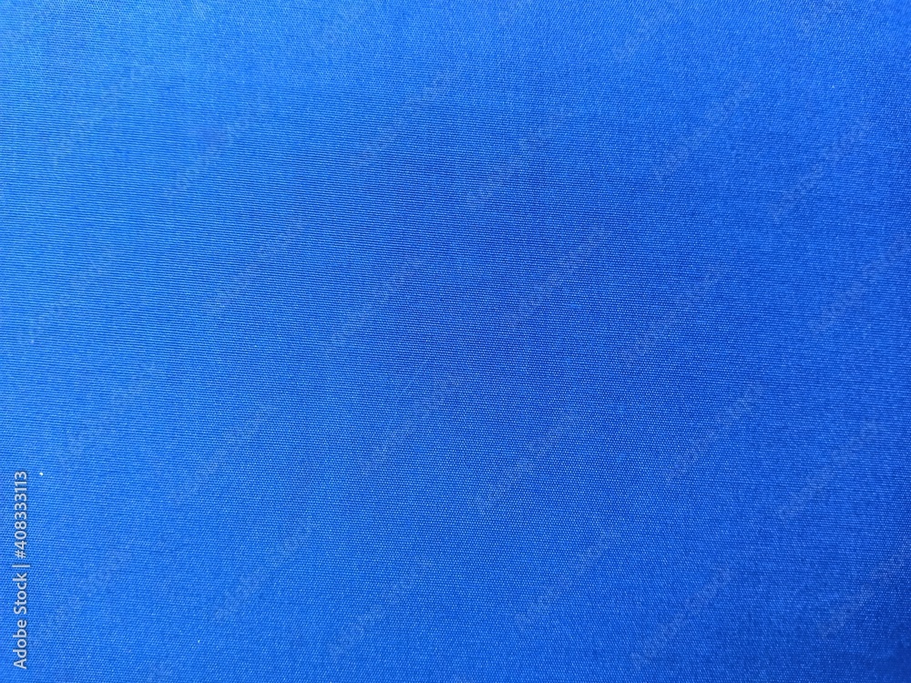 blue fabric texture as background. blue fabric texture as background.