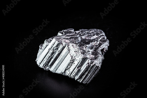 neodymium is a magnetic chemical element with the symbol Nd, in solid state. It is part of the rare earth group, used in the technology industry photo