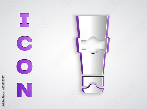 Paper cut Tube of toothpaste icon isolated on grey background. Paper art style. Vector.