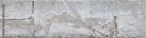 Panel kuchenny z motywem Old crumbling concrete wall in panoramic format.