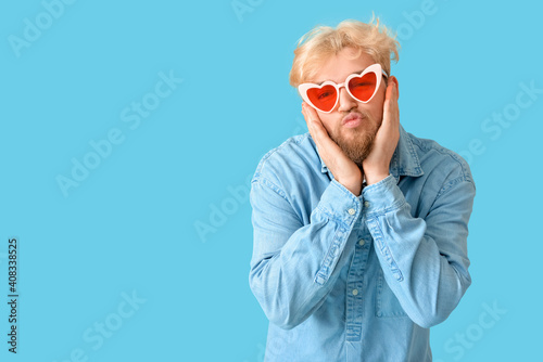 Cute man wearing heart-shap...