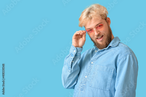 Handsome man wearing heart-...