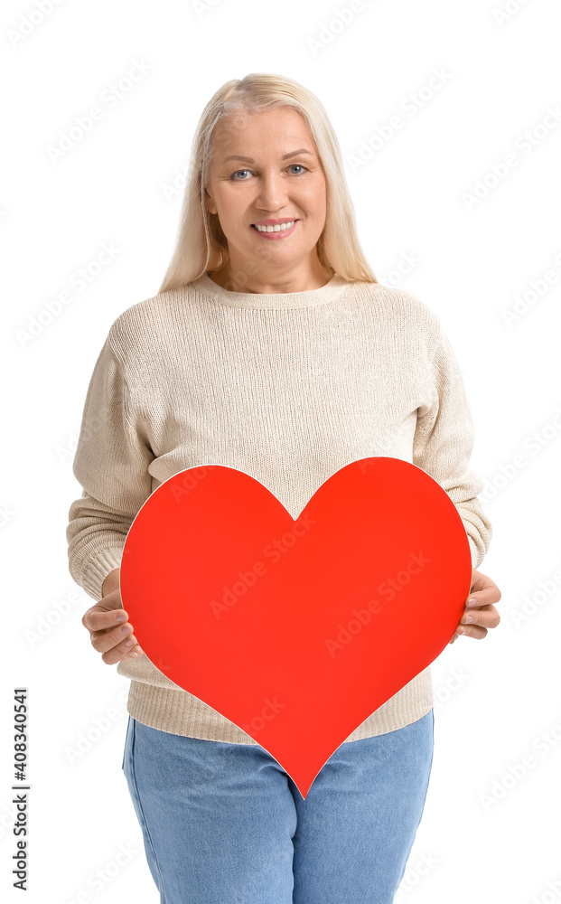Mature woman with red heart on white background Mature woman with red heart on white background