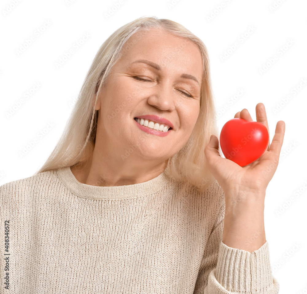 Mature woman with red heart on white background