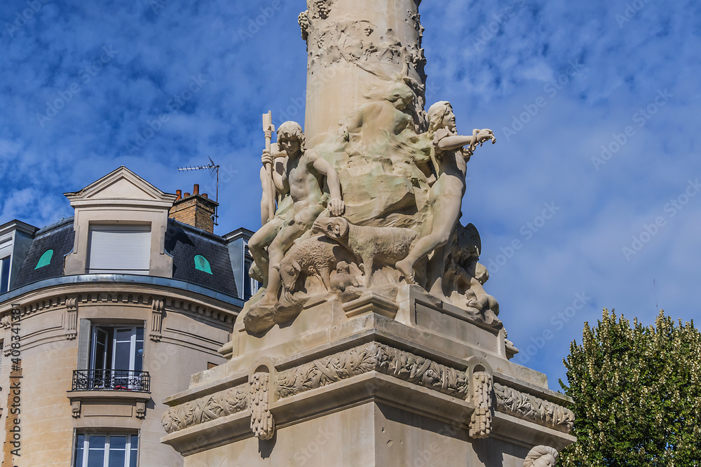 Ancient monumental fountain Sube with golden Angel at top erected in middle of Place d'Erlon, four statues represent Region Rivers: Marne, Vesle, Suippe and Aisne. Reims, Champagne-ardenne, France.