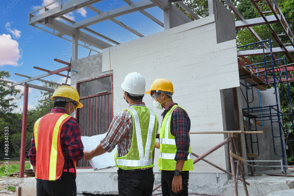 Roofer Construction worker install new roof,Roofing tools,Electric drill used on new roofs with Metal Sheet. Roofer Construction worker install new roof,Roofing tools,Electric drill used on new roofs with Metal Sheet.