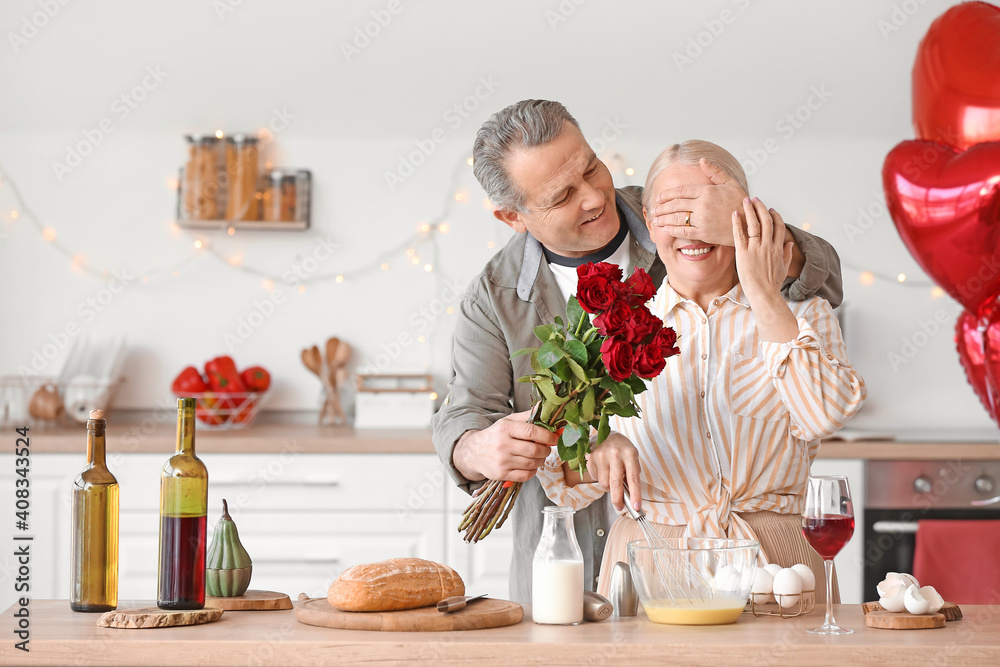 Mature couple celebrating Valentine's Day at home Mature couple celebrating Valentine's Day at home