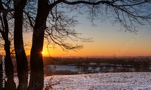 Sunrise over London from Harrow Weald in snowy winter morning, London 