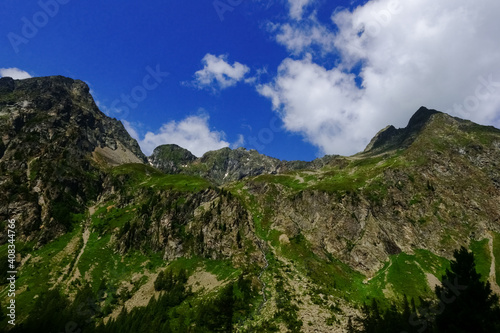 wonderful mountains with blue sky and clouds in the summer