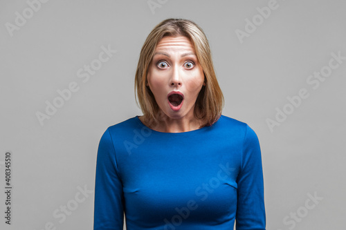 Fotografie, Obraz Wow, I can't believe this! Portrait of astonished woman with stunned shocked face