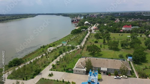 Holy Assumption Church along the Danube Embankment in the park in Izmail city aerial view. photo
