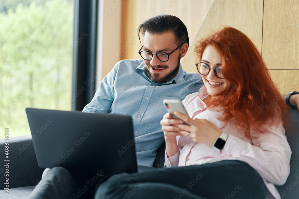Happy family couple shopping online in internet