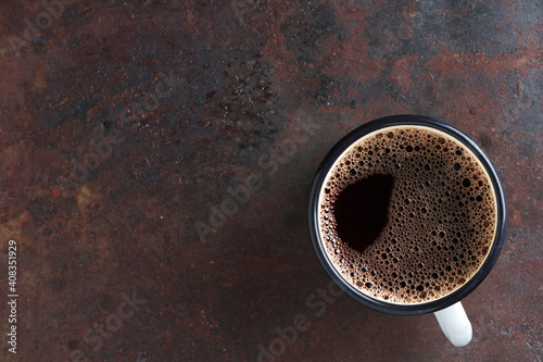 Fotografie Coffee in an enamel mug