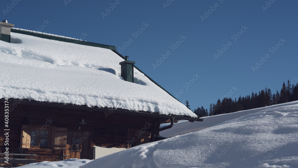 snow wandering in a village on the mountains on a beautiful sunny winter day snow wandering in a village on the mountains on a beautiful sunny winter day