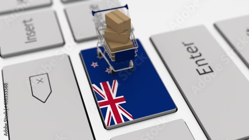 Shopping cart on the keyboard key with flag of New Zealand. Looping ecommerce related 3d animation photo