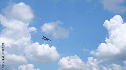Military aircraft flying through the sky. Sunny weather. © art24pro