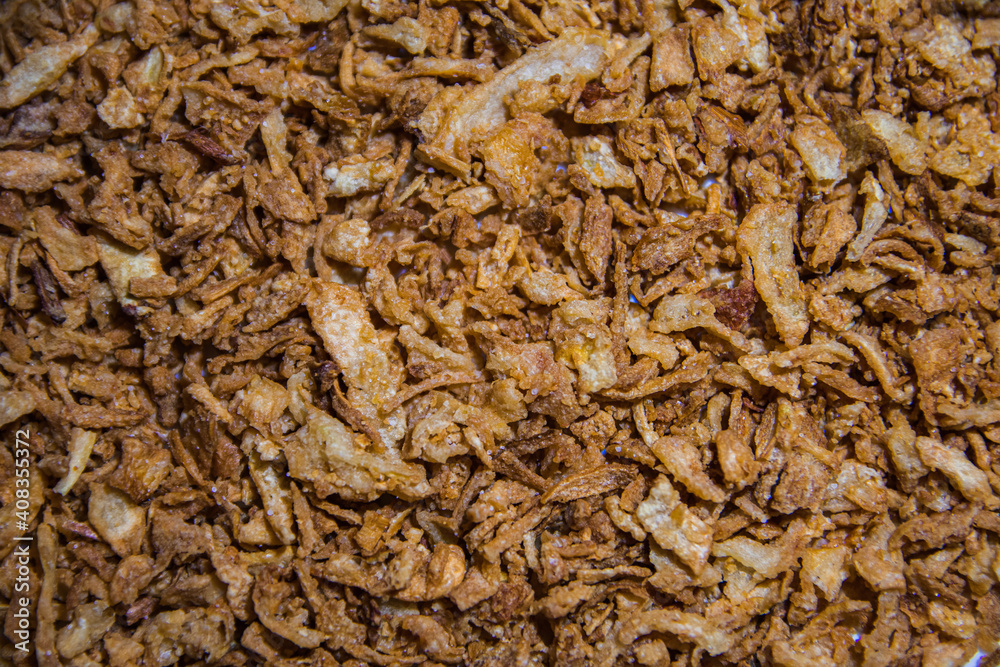 Crispy fried onion texture close-up Crispy fried onion texture close-up