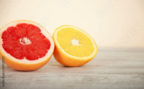 orange and grapefruit on a white table background