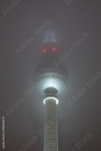 Berlin TV Tower at a foggy night