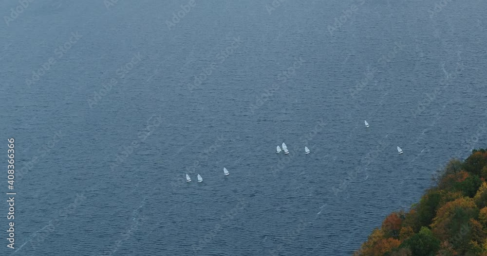 Sailing in Kaunas sea, Lithuania. Dron aerial view. Autumn season Sailing in Kaunas sea, Lithuania. Dron aerial view. Autumn season