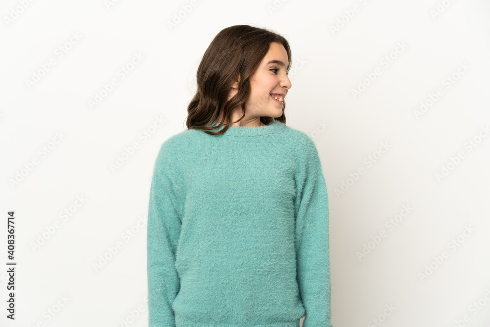 Little caucasian girl isolated on white background looking side Little caucasian girl isolated on white background looking side