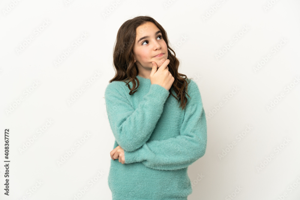 Little caucasian girl isolated on white background having doubts Little caucasian girl isolated on white background having doubts