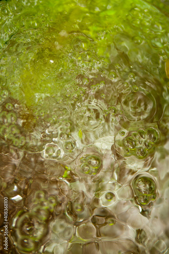 bubbling water with green illumination