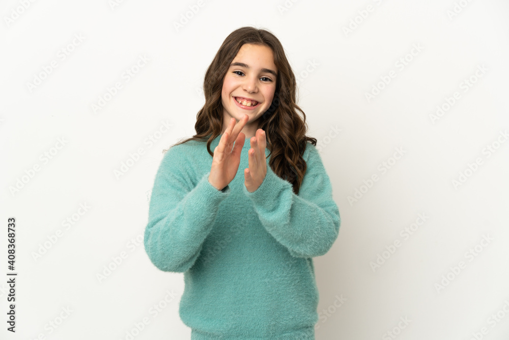 Little caucasian girl isolated on white background applauding after presentation in a conference Little caucasian girl isolated on white background applauding after presentation in a conference