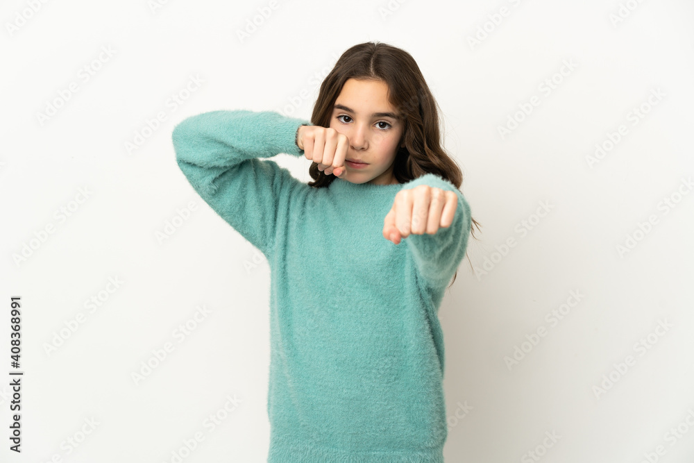 Little caucasian girl isolated on white background with fighting gesture Little caucasian girl isolated on white background with fighting gesture
