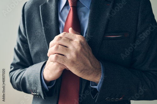 Tableau sur toile Anxious businessman wringing hands